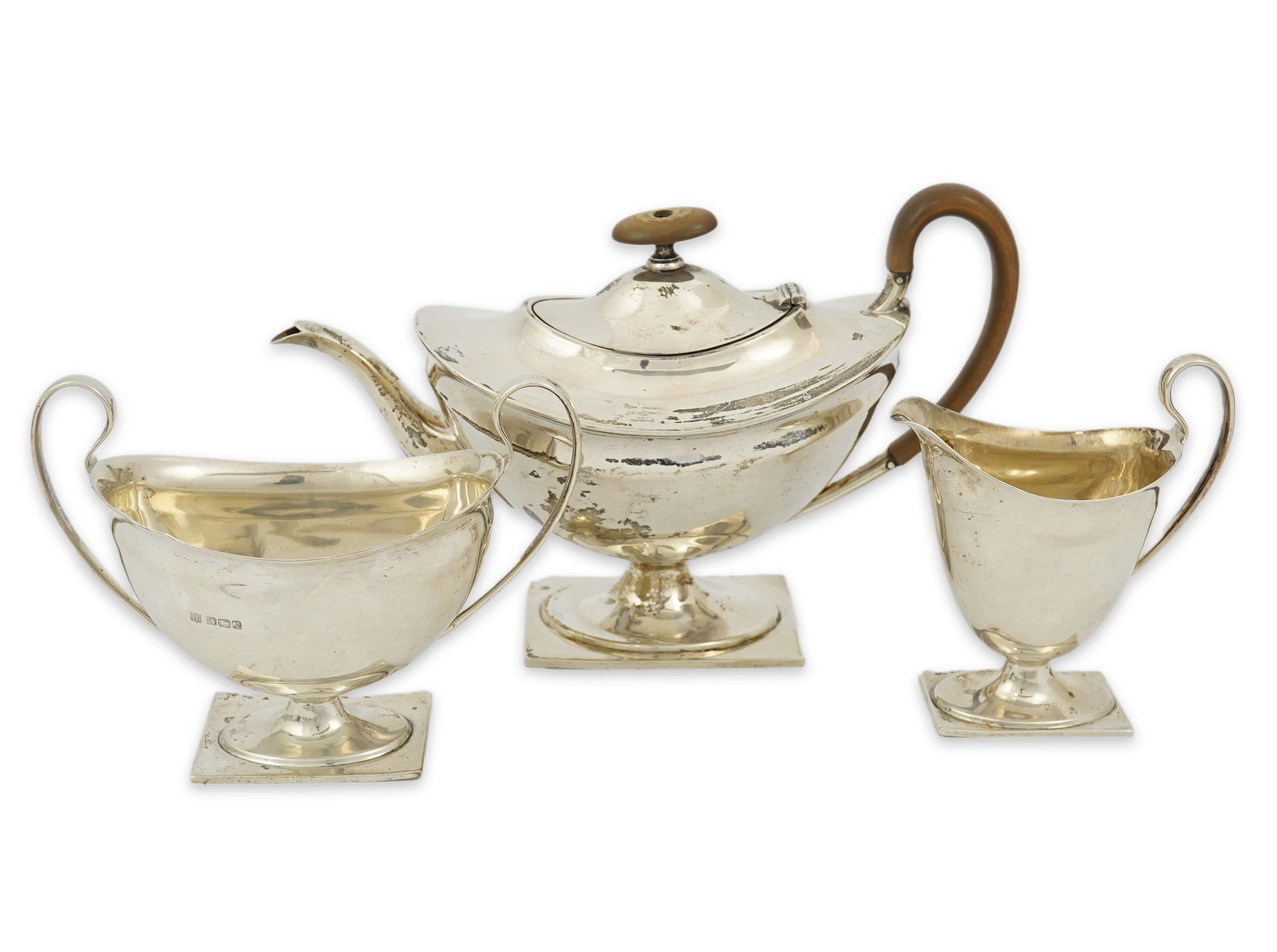 A George V silver three piece tea set by Fenton Brothers Ltd